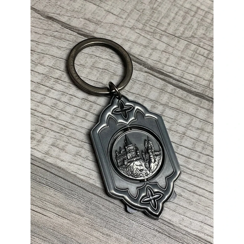Universal Studios Harry Potter Spinning Hogwarts Keychain Zoe Nameplate Pewter